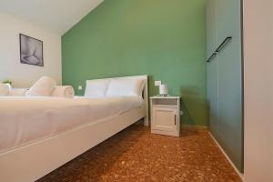 Postel nebo postele na pokoji v ubytování Italianflat - University rooms