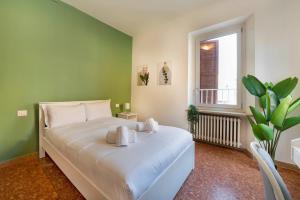 Postel nebo postele na pokoji v ubytování Italianflat - University rooms
