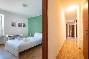 Postel nebo postele na pokoji v ubytování Italianflat - University rooms