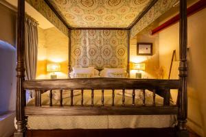 Posteľ alebo postele v izbe v ubytovaní Ronda Romántica Lofts