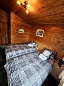 Voodi või voodid majutusasutuse 3 Bedroom Ocean View Lodge toas