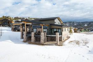a house in the snow in the winter at Lone Eagle 765 in Granby