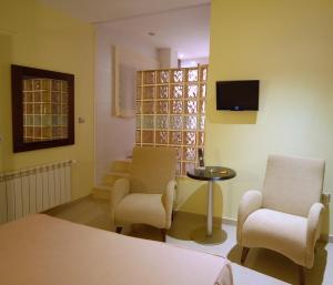 Telewizja i/lub zestaw kina domowego w obiekcie Hotel Macami