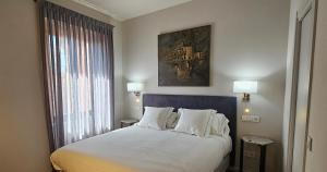 Postel nebo postele na pokoji v ubytování Posada San Ginés - Boutique rooms