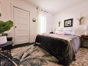 a bedroom with a bed and a rug at Yadkin Valley Retreat in Jonesville