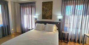Postel nebo postele na pokoji v ubytování Posada San Ginés - Boutique rooms