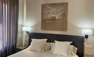 Postel nebo postele na pokoji v ubytování Posada San Ginés - Boutique rooms + 19 fotografií