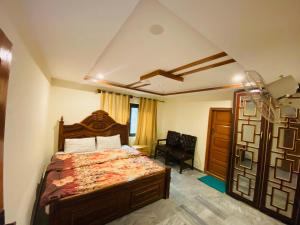 Postel nebo postele na pokoji v ubytování Skardu Rock View Hotel