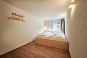 Lauterbrunnen Central 2客房内的一张或多张床位