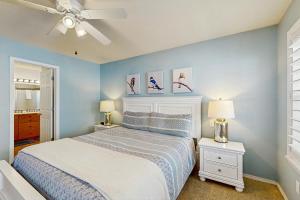 En eller flere senge i et værelse på Country Retreat