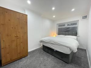 Ένα ή περισσότερα κρεβάτια σε δωμάτιο στο Harmin Lodge