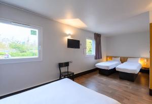 Postel nebo postele na pokoji v ubytování B&B HOTEL Creil Chantilly + 37 fotografií