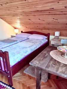 Postel nebo postele na pokoji v ubytování Putnicka kuca kod Dragane