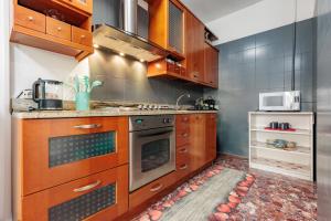 A kitchen or kitchenette at Appartamento Milly