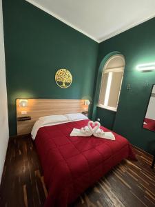Postel nebo postele na pokoji v ubytování Il Piccolo Albergo Matera
