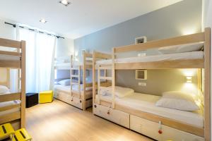Ένα ή περισσότερα κρεβάτια σε δωμάτιο στο Hostel Sea Breeze