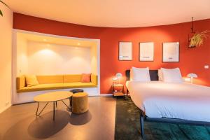 Postel nebo postele na pokoji v ubytování Gooiland Hotel