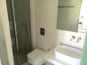 Koupelna v ubytování Hotel Nazos