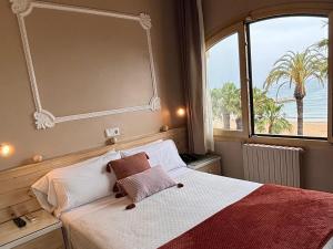 Postel nebo postele na pokoji v ubytování Hotel Celimar
