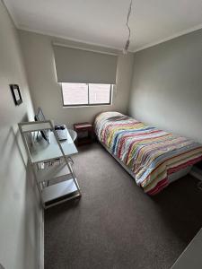 En eller flere senge i et værelse på Hermosa Casa en Colina