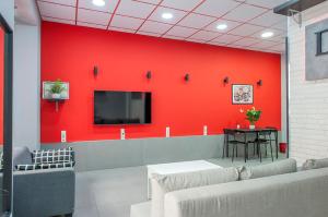 Μια τηλεόραση ή/και κέντρο ψυχαγωγίας στο J&N Apartament La Palmera 1 +5 φωτογραφίες