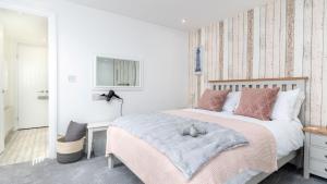 Ένα ή περισσότερα κρεβάτια σε δωμάτιο στο Pebble Beach