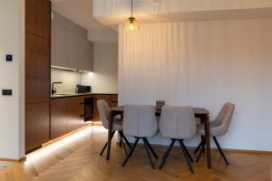 Kuchyň nebo kuchyňský kout v ubytování Heven Apartments Karusselli