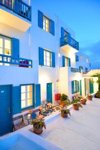 a large building with a lot of windows at Hotel Nazos in Mikonos