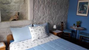 Llit o llits en una habitació de Villa Tudor
