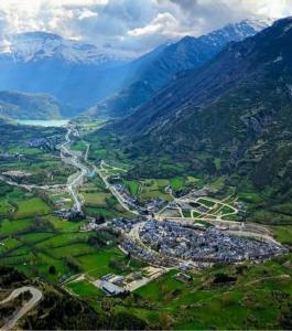 an aerial view of a town in the mountains at Apartamento céntrico en Benasque in Benasque