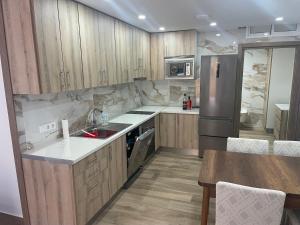 Kuchyň nebo kuchyňský kout v ubytování Ferienwohnung Benidorm