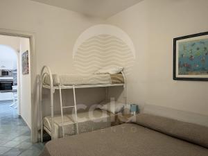 Ένα ή περισσότερα κρεβάτια σε δωμάτιο στο Villa Blumarine e vasca jacuzzi By Cala Salento +71 φωτογραφίες