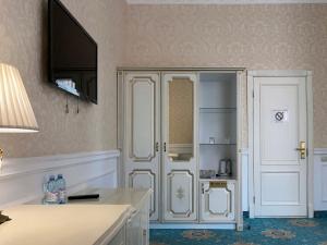 Kúpeľňa v ubytovaní Royal Grand Hotel