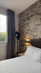 Postel nebo postele na pokoji v ubytování Colectia Hotel Urumea