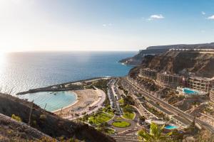 an aerial view of a resort next to the ocean at Vista Calma Suite Puerto Rico in Puerto Rico de Gran Canaria