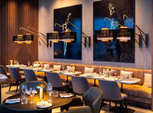 Un restaurant sau alt loc unde se poate mânca la Radisson Blu Hotel at Porsche Design Tower Stuttgart