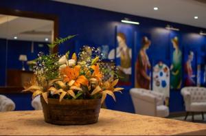 Un lugar para sentarse en Valley Suites Apartamentos Premium con Cochera, Gimnasio y Piscina