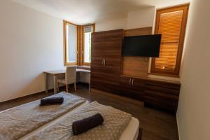 Posteľ alebo postele v izbe v ubytovaní Jacht Apartmanok
