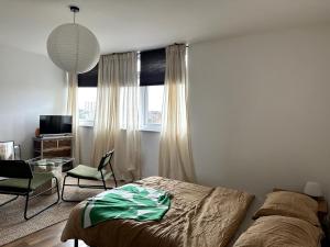 TV a/nebo společenská místnost v ubytování Flat-on-Sea