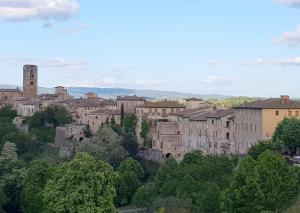 a view of a city with buildings and trees at Chianti 22 in Poggibonsi