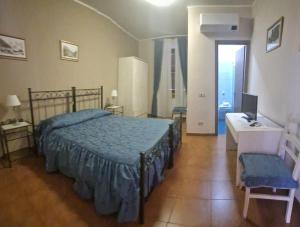 Postel nebo postele na pokoji v ubytování Albergo ristorante Da Tunon