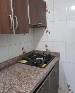 Kuchyň nebo kuchyňský kout v ubytování Cabaña para 12 personas en coveñas + 6 fotografií