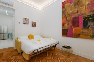 Ένα ή περισσότερα κρεβάτια σε δωμάτιο στο Jonathan Luxury Apartment Trieste Station