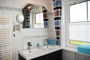 Ένα μπάνιο στο Ferienwohnung Springfloot Dagebüll