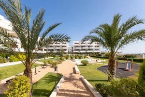 A garden outside Oriuelha Costa Terrazas de Campoamor