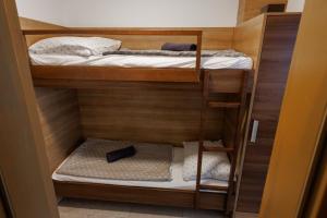 Posteľ alebo postele v izbe v ubytovaní Jacht Apartmanok