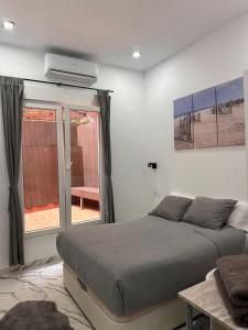Posedenie v ubytovaní Apartamento en Planta Baja Cerca de la Playa en Badalona