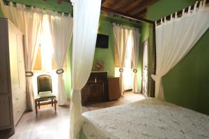 Postel nebo postele na pokoji v ubytování Posada Villa Maria