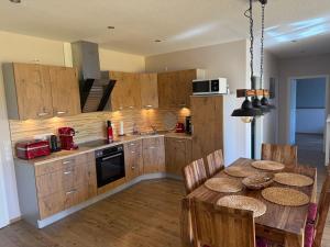 Kuchyň nebo kuchyňský kout v ubytování Ferienhaus-Maxe-Wohnung-Hannah