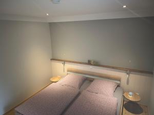 Postel nebo postele na pokoji v ubytování Ferienhaus-Maxe-Wohnung-Hannah